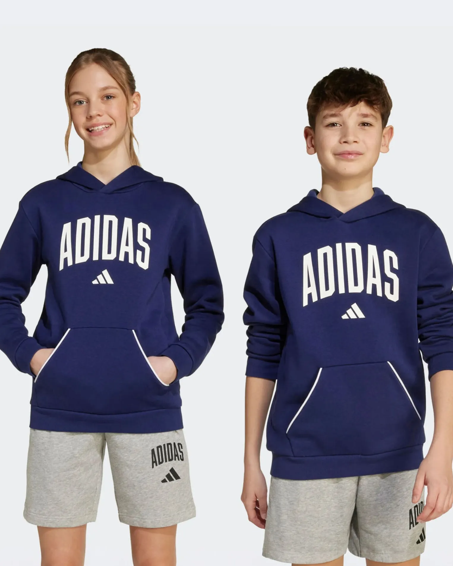 ADIDAS - FELPA CON CAPPUCCIO JUNIOR BLU E BIANCA COLLEGE OVERHEAD FLEECE HOODIE - JV7338