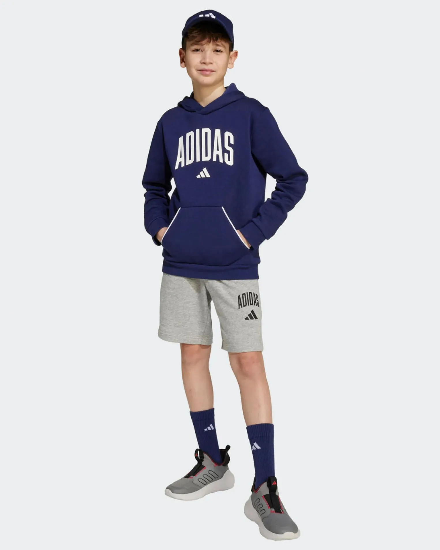 ADIDAS - FELPA CON CAPPUCCIO JUNIOR BLU E BIANCA COLLEGE OVERHEAD FLEECE HOODIE - JV7338