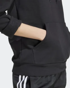 ADIDAS - FELPA NERA DA DONNA CON CAPPUCCIO E STAMPA ANIMALIER IW5152