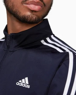 ADIDAS - GIACCA DA ALLENAMENTO PRIMEGREEN ESSENTIALS WARM-UP 3-STRIPES - H46100