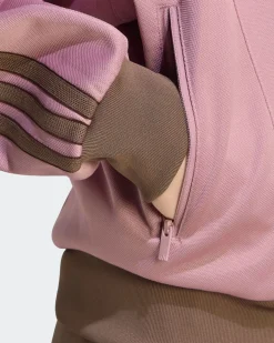 ADIDAS - GIACCA DA ALLENAMENTO FULL ZIP ST FD TRACK TOP ROSA CON DETTAGLI MARRONI DA DONNA, KV0601