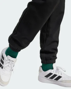 ADIDAS - PANTALONI DA TUTA JUNIOR NERI ESSENTIALS SLIM FLEECE PANTS - JC9765