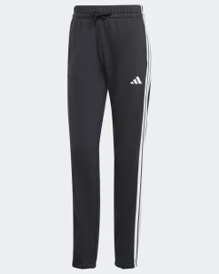 ADIDAS - PANTALONI TUTA  DONNA NERO CON BANDE BIANCHE ESSENTIALS 3-STRIPES FRENCH T.CUFFED - JD5302