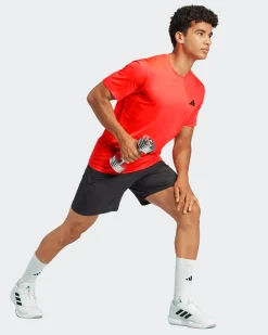 ADIDAS - T-SHIRT ARANCIONE FLUO DA  UOMO PER ALLENAMENTO ESSENTIALS TRAINING - JX2724