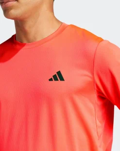ADIDAS - T-SHIRT ARANCIONE FLUO DA  UOMO PER ALLENAMENTO ESSENTIALS TRAINING - JX2724