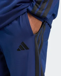 ADIDAS -  TUTA UOMO BLU CON 3 BANDE NERE ESSENTIALS 3-STRIPES -KB7657