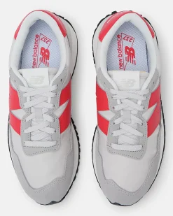 NEW BALANCE - Sneakers da uomo grigia e rossa con dettagli scamosciati - 237