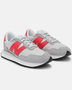NEW BALANCE - Sneakers da uomo grigia e rossa con dettagli scamosciati - 237