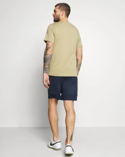 NIKE - Pantaloni corti da uomo blu in tessuto traspirante con logo bianco