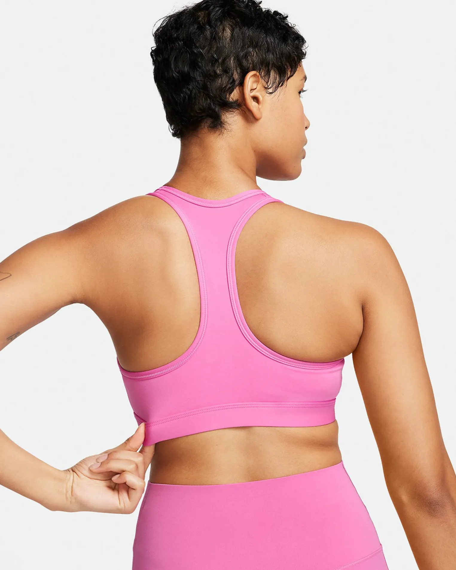 NIKE – TOP DA DONNA ROSA SWOOSH MEDIUM SUPPORT BRA – DX6821/675