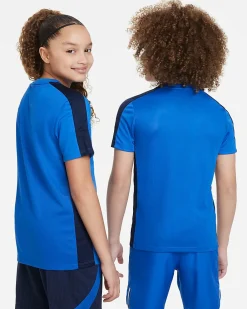 NIKE - T shirt da bambino azzurra con bande laterali blu e logo bianco