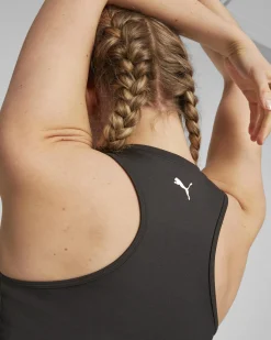 PUMA - Top nero in tessuto traspirante con logo oro
