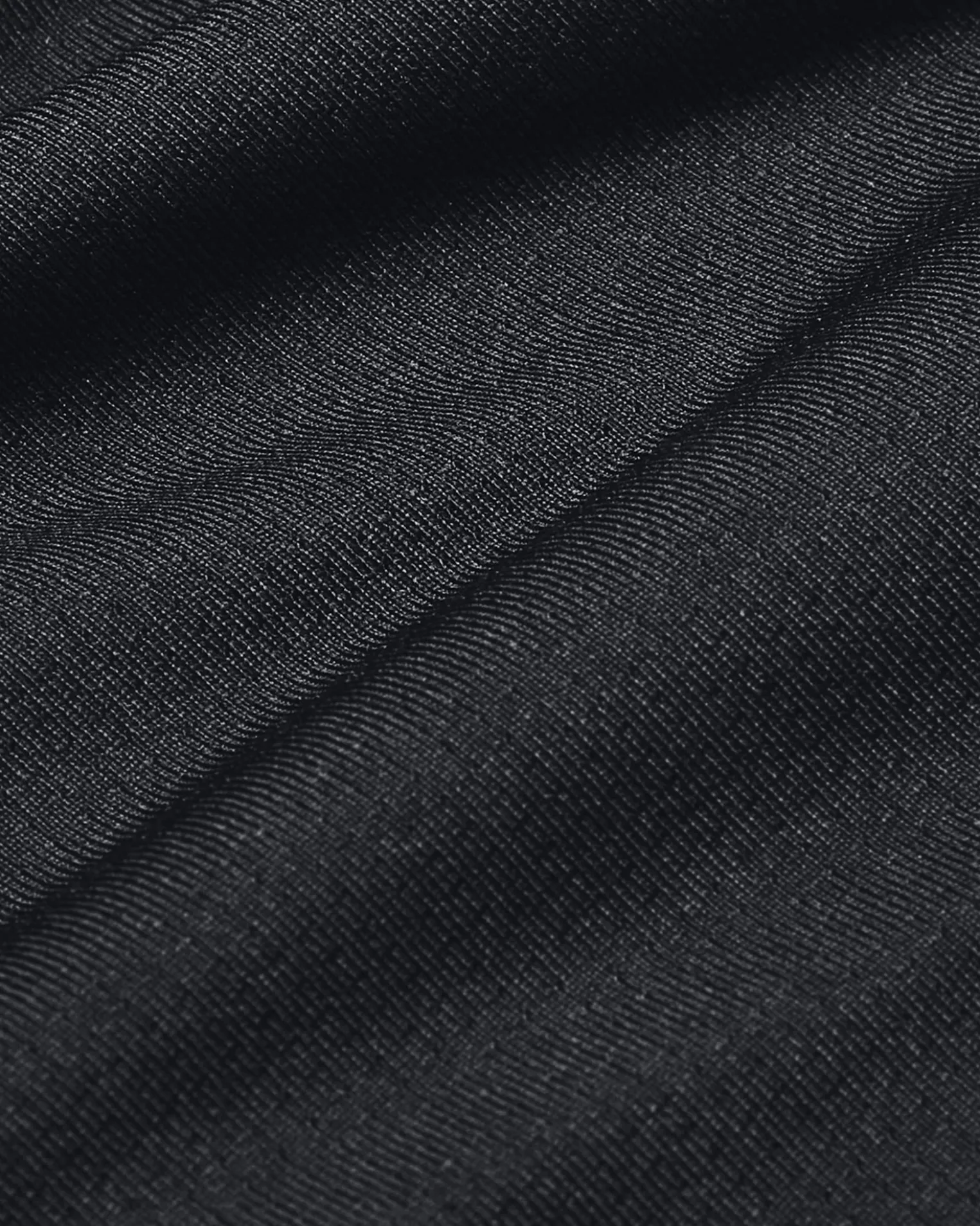UNDER ARMOUR - Top nero ultra aderente in tessuto traspirante con logo bianco